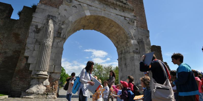 guided tour at the Arch of Augustus