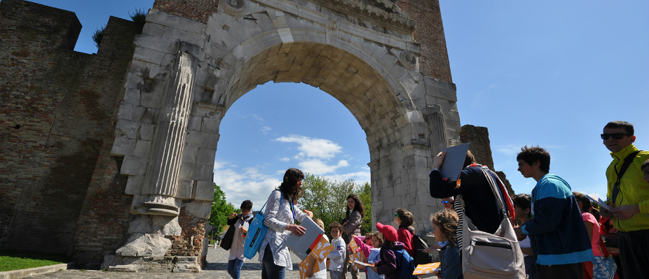 guided tour at the Arch of Augustus